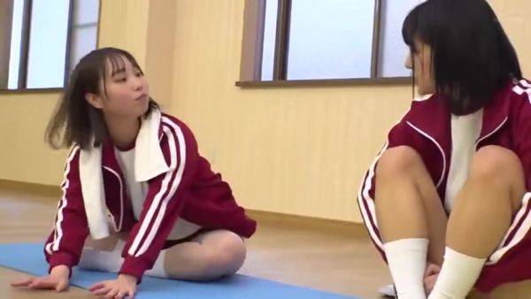 Two beautiful girls in gym clothes lay down a mat and rub and lick the cute breasts of their gymnastics friend - senzuri.tube on gratisflix.com